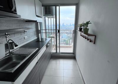 Modern kitchen with balcony view