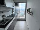 Modern kitchen with balcony view