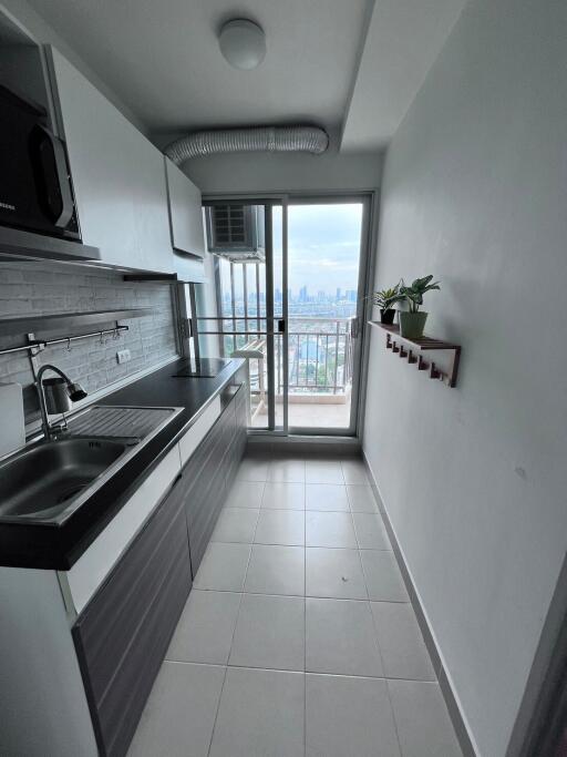 Modern kitchen with balcony view