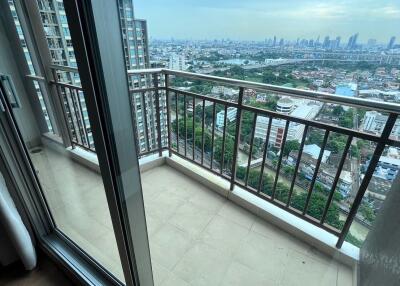 View of the balcony with cityscape in the background