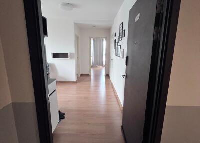 A view of the hallway leading to different rooms in the house