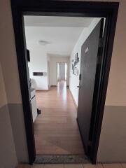 A view of the hallway leading to different rooms in the house