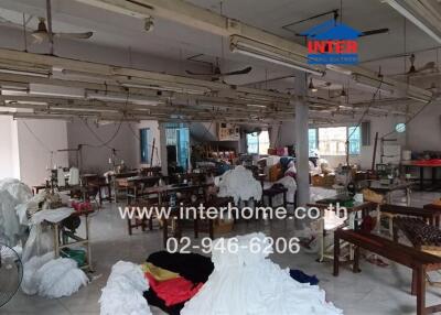 Industrial workspace with sewing machines and fabric