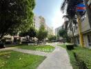 Outdoor view of residential complex with walkway and greenery