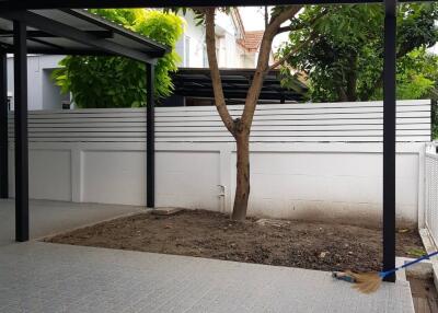 Covered patio with garden in a residential property