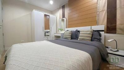 Modern bedroom with bed and wardrobe