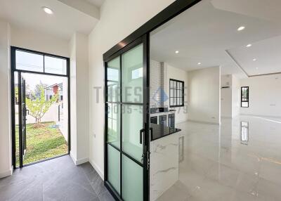 Modern living area with glass doors and open layout