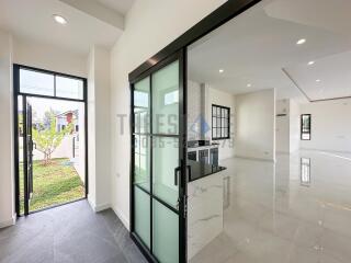 Modern living area with glass doors and open layout