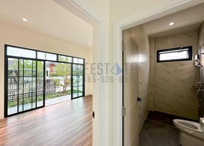 Main living space with view of bathroom