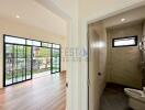 Main living space with view of bathroom