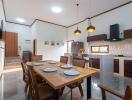 Modern kitchen and dining area with wooden accents