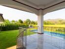 Outdoor patio with pool and garden view