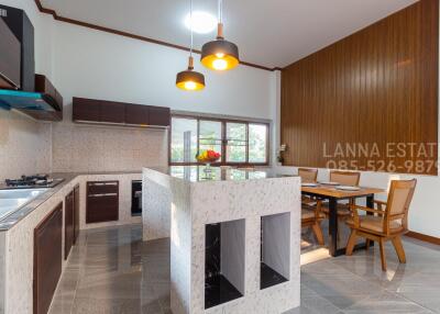 Modern kitchen with island and dining area