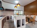 Modern kitchen with island and dining area