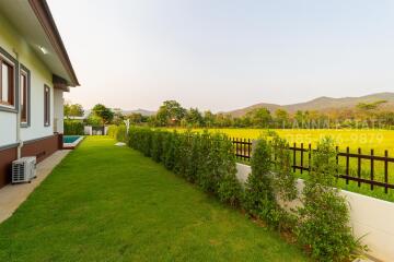 View of the lawn and garden next to the property