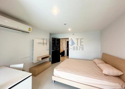 Bedroom with modern furniture and air conditioning