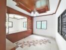 Spacious living room with decorative ceiling and chandelier