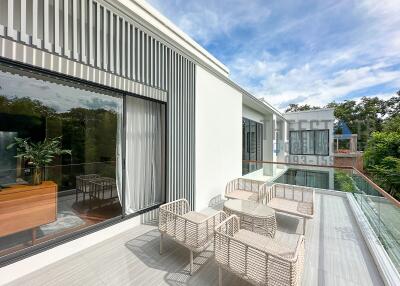 Modern balcony with outdoor seating and scenic view