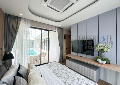 Modern bedroom with pool view