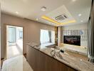 Modern living room with marble countertop and recessed lighting