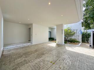 Covered outdoor space in a modern white building