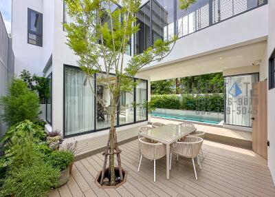 Modern backyard with seating area and pool