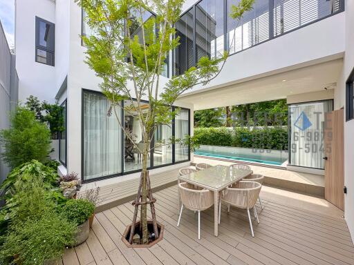 Modern backyard with seating area and pool