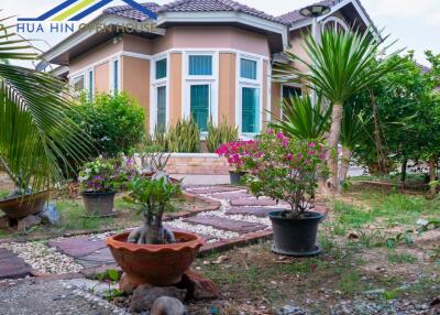 Exterior view of the house with garden