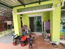 Covered outdoor area with toys and furniture