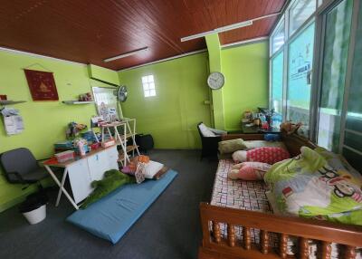 Colorful bedroom with various furniture and decorations