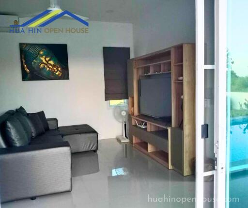 Modern living room with sofa and TV stand