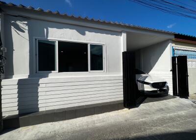 Exterior view of the building with a garage