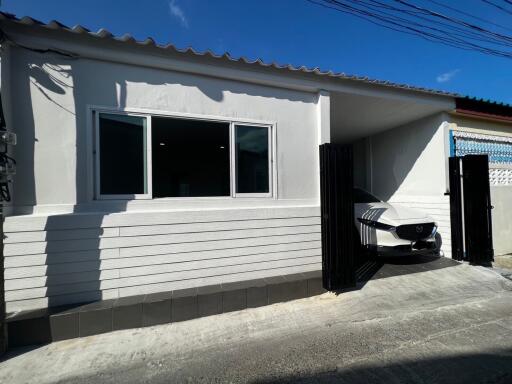 Exterior view of the building with a garage