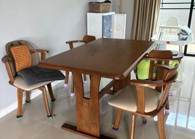 A modern dining area with wooden furniture