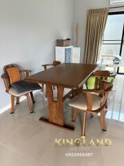 A modern dining area with wooden furniture