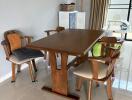 A modern dining area with wooden furniture