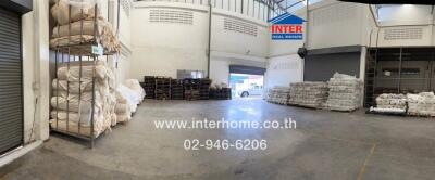 Indoor warehouse space with storage and loading areas