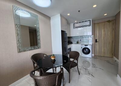 Modern kitchen and dining area with appliances