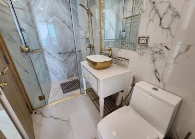 Luxury bathroom with marble walls