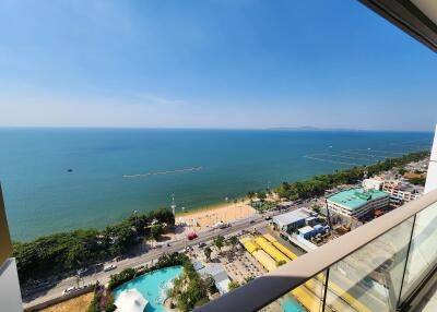 Balcony view over beach with clear blue sea