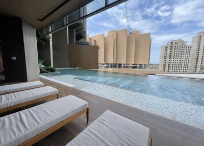 Outdoor Pool Area with Lounge Chairs