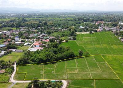 Aerial view of a land plot in a green rural area