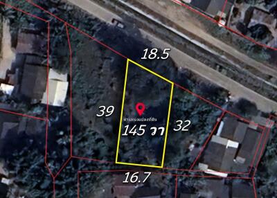 Aerial view of a land plot with measurements and boundaries