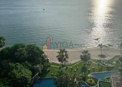 view of ocean and swimming pool from high-rise building