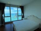 bedroom with sea view and large window