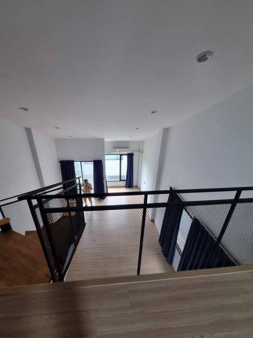 Modern loft with a mezzanine and large windows