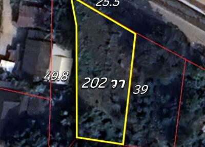 aerial view of a land plot with dimensions marked