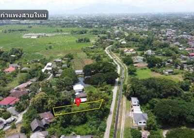 Aerial view of a plot of land in a residential area