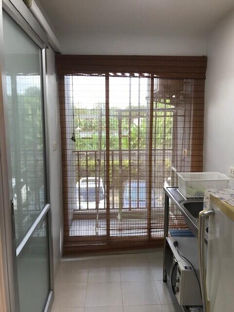 Small kitchen with window and sliding glass doors