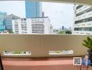 View from the balcony overlooking city buildings